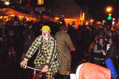 Christmas Fayre - Clowning around on their strange bike