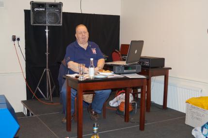 Quiz master Iain takes centre stage