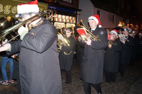 The brass band leads the way