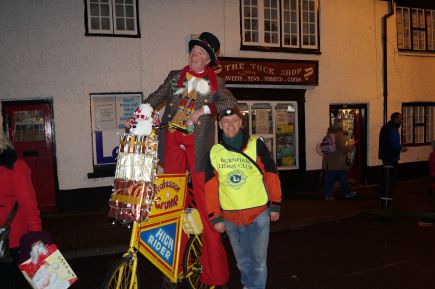 Everyone feels short next to the man on stilts